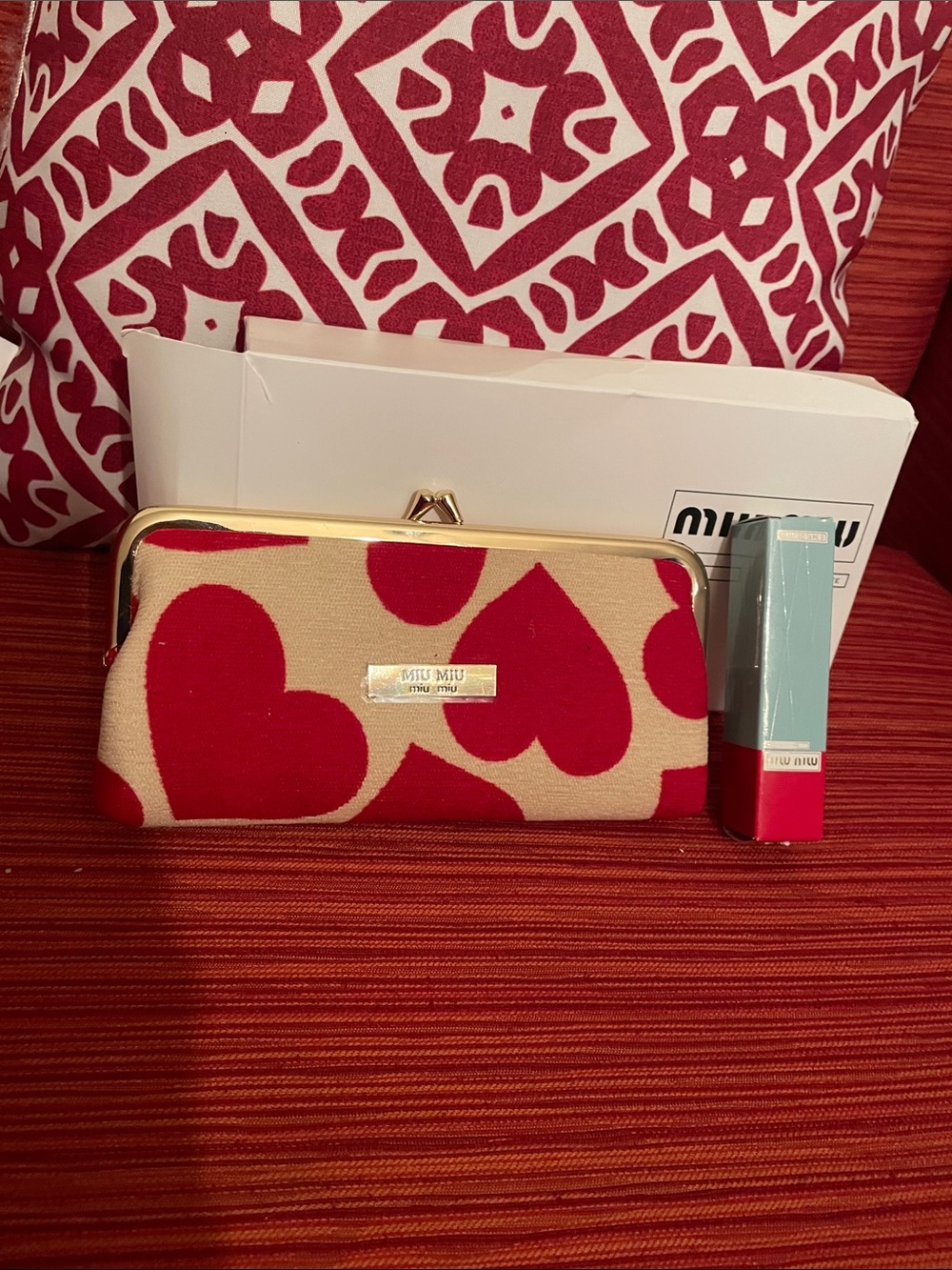 Miu Miu Beige pochette with fragrance